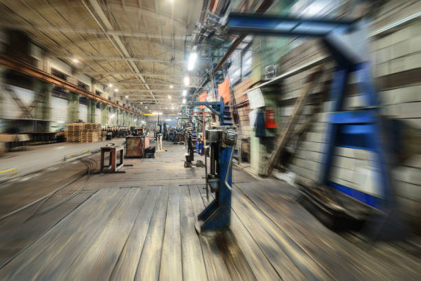 istock Factory shop. Abstract industrial background, motion blur effect 908948454