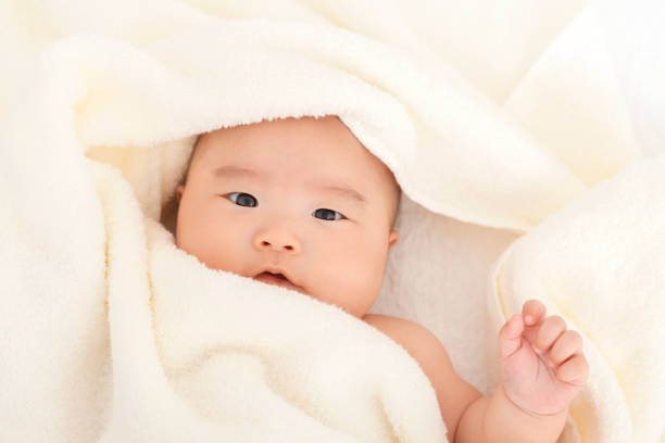 istock Baby wrapped in a towel 908952938