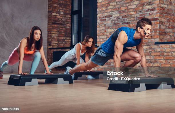 A Man Learning Women How To Do Push Ups Stock Photo - Download Image Now - Staircase, Exercising, Gym