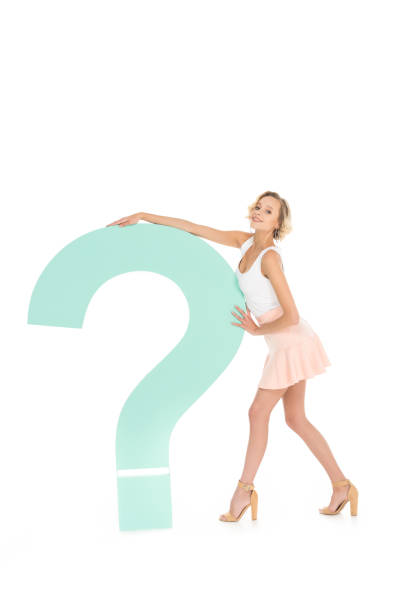 istock smiling young woman with question mark isolated on white 908963534
