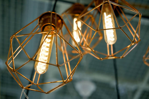 istock vintage lightbulb with golden or brass decoration 908963798