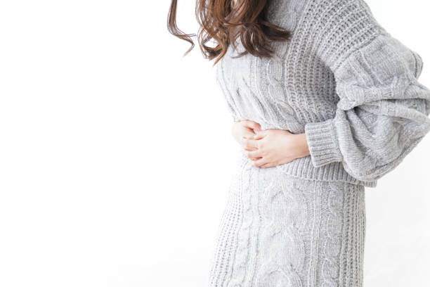 istock Woman suffering from stomachache 908964468