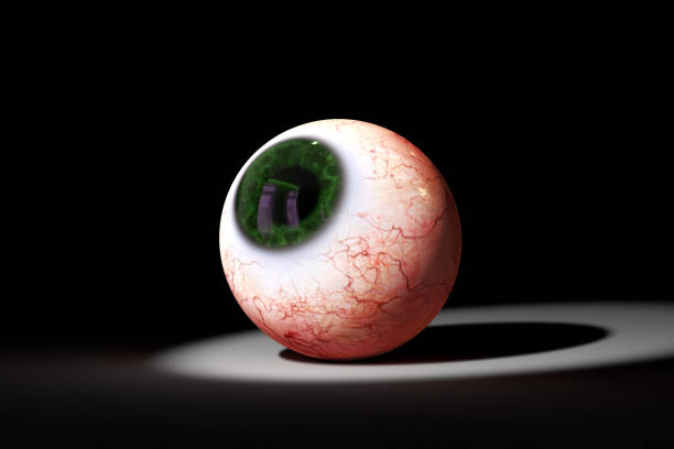 istock realistic human eyeball with green iris looking into a spotlight (3d illustration) 908968958