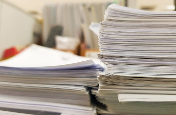 istock Stacks of paper for Business and office concept background. 908970976
