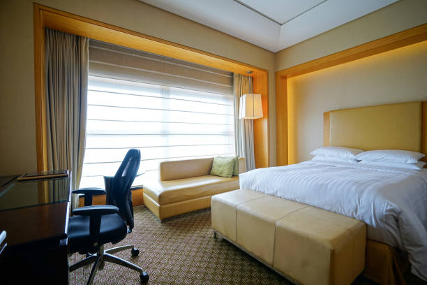 istock Elegant and comfortable bedroom interior 908973534