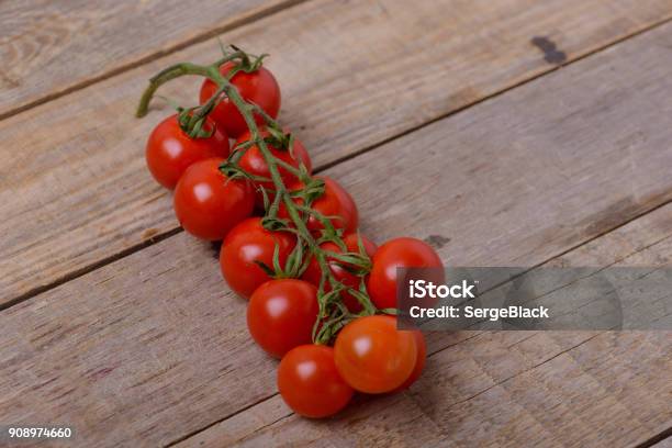 Fresh Cherry Tomatoes On Wooden Background Stock Photo - Download Image Now - Agriculture, Backgrounds, Cherry Tomato