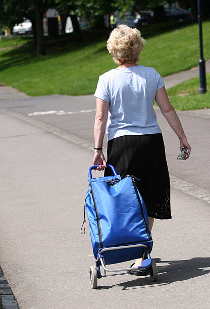 istock Senior women shopping 90897624