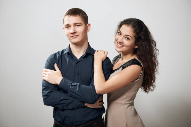 istock couple portrait on white background 908977460