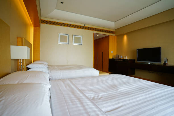 istock Elegant and comfortable bedroom interior 908977736