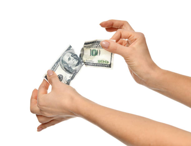 istock Torn ripped money real hundred dollars 908978550