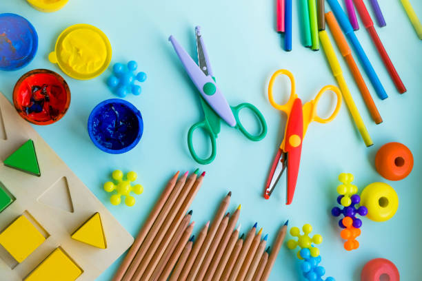 istock Office and student accessories on a pink. Back to school concept. School, education and learning concept. creativity for kids. Top view colorful background. Flat lay 908982572