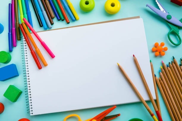 istock Top view on colorful paints and brushes. Creative ideas, creativity and early learning. Education concept 908982644