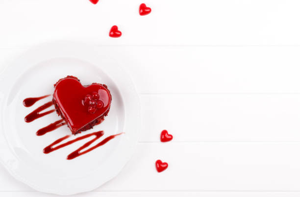 istock Heart shaped red velvet cake 908989592