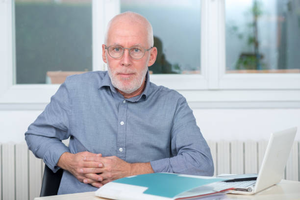 istock a portrait of  handsome mature man with beard 909000436