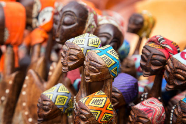 istock African carved group of women 909005356