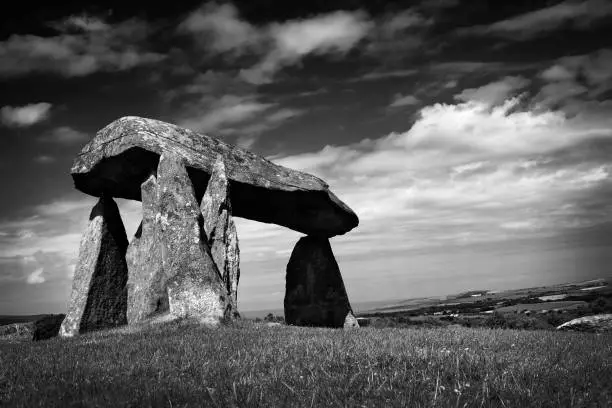 The Pentre Ifan prehistoric megalithic burial chamber which dates from approx 3500BC in Pembrokeshire, Wales, UK black and white monochrome image