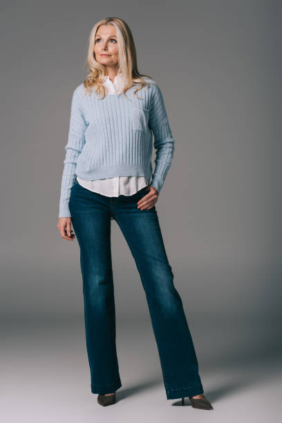 istock mature woman in bell-bottoms 909009970