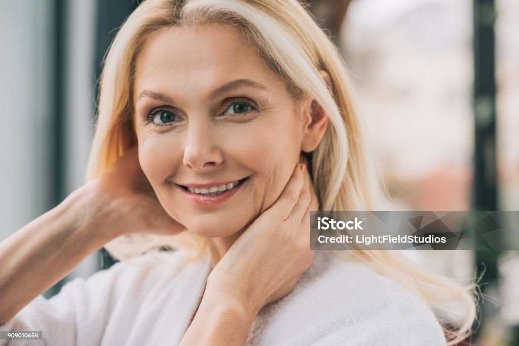 beautiful mature woman close-up portrait of beautiful mature woman looking at camera Mature Women Stock Photo
