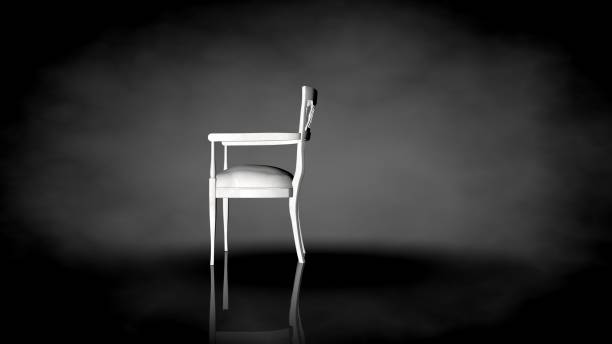 istock 3d rendering of a white chair on a black background 909013728