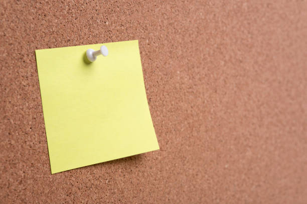 istock sticky note or post is on cork bulletin billboard. 909019998