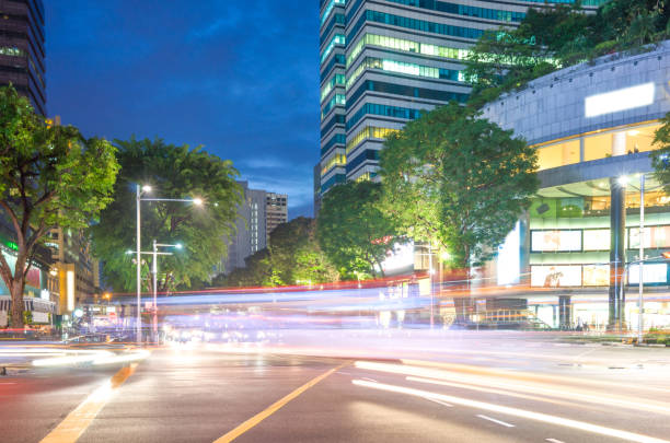 istock modern buildings near road in modern city 909021192