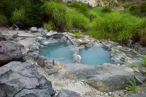 Open-air thermal spring wild bath hidden in the mountains closeby Myoban Onsen village, Beppu, Japan