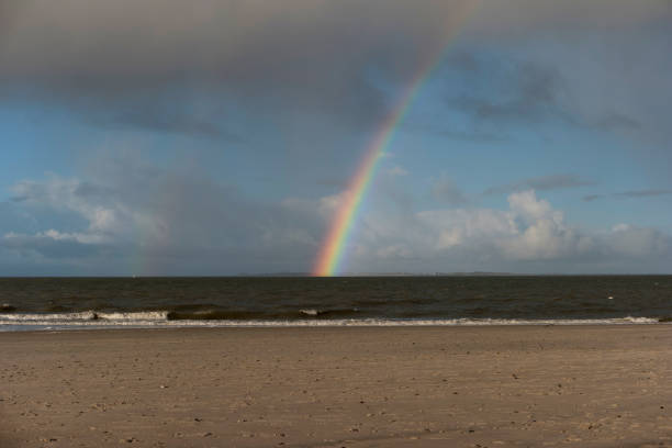 istock Rainbow on the North Frisian Island Amrum in Germany 909025744