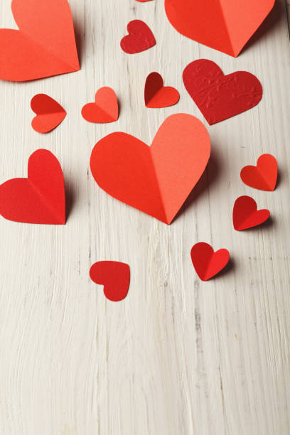 istock Valentine day background, handmade hearts on wood with copy space 909034152