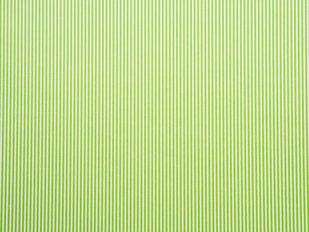 istock Green pastel striped paper background 909036564
