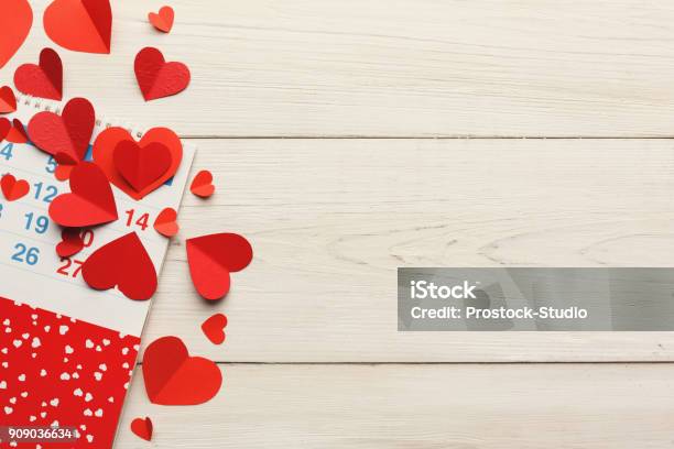 Calendar Page With The Red Hearts On February 14 Stock Photo - Download Image Now - Calendar, Valentine's Day - Holiday, Heart Shape