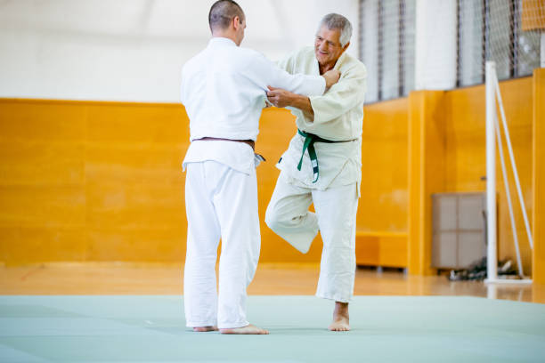 istock Two Judoists in a Judo Match 909037732