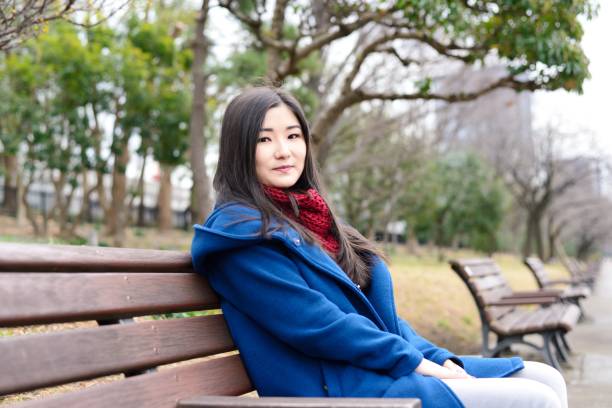 istock Teenager sitting outside 909041090