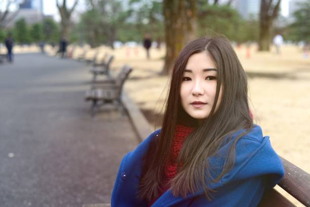 istock Teenager sitting outside 909041248