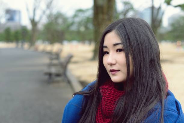 istock Teenager sitting outside 909041300
