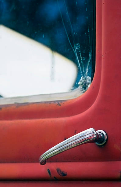 istock Red Truck Doorhandle and Broken Window 90904397
