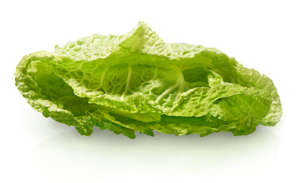 istock Green salad isolated on white background 909044590