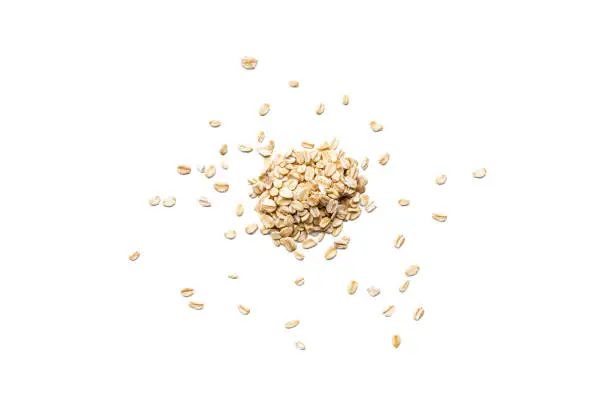 Photo of Organic oat flakes isolated on white background