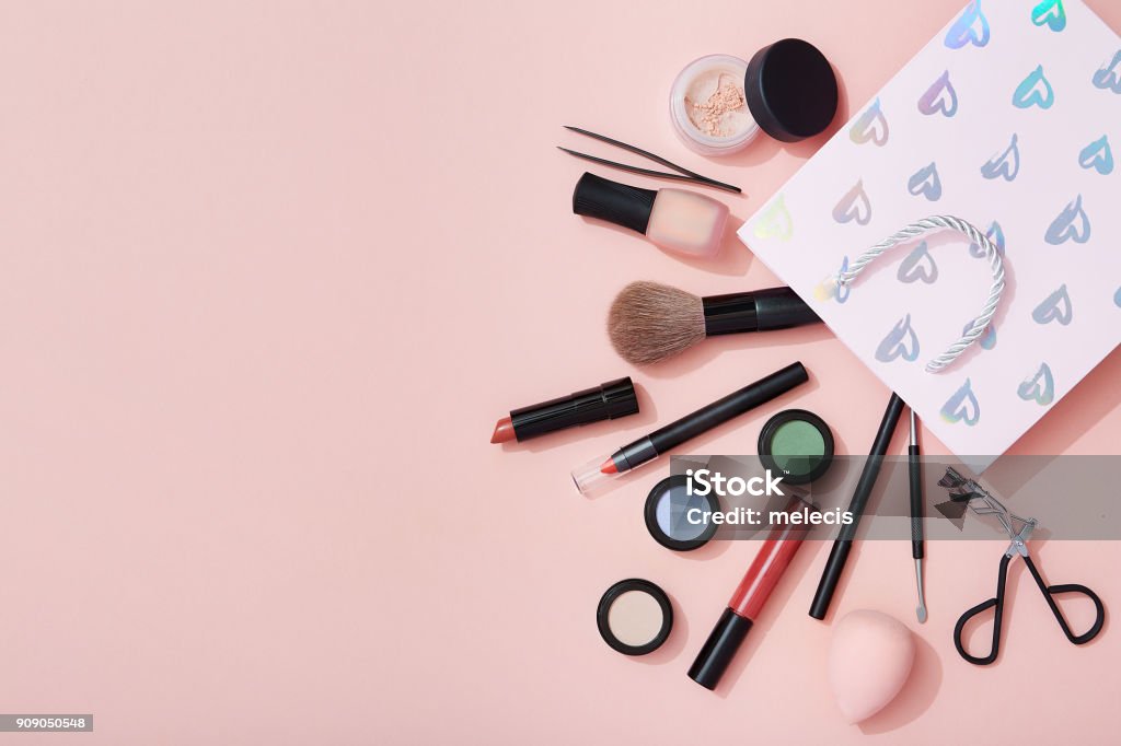 Beauty products and a gift bag flat lay on pink background Valentine's Day - Holiday, Make-up, shopping bag, flat lay, gift, pink color Make-Up Stock Photo