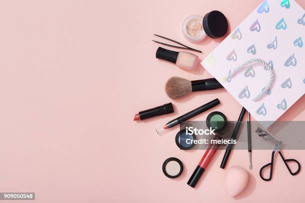 Beauty Products And A Gift Bag Flat Lay On Pink Background Stock Photo - Download Image Now