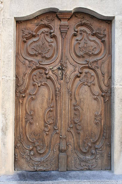 istock Handcarved, ancient, wooden door. 90905994
