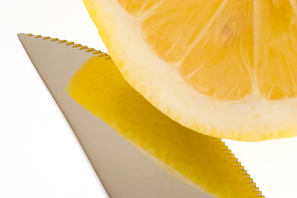 Lemon an knife stock photo
