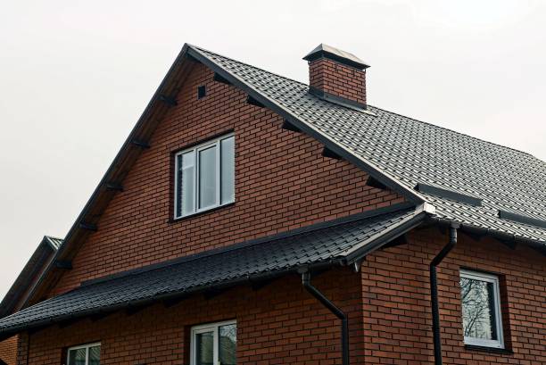 istock Part of a new brown private house 909068682