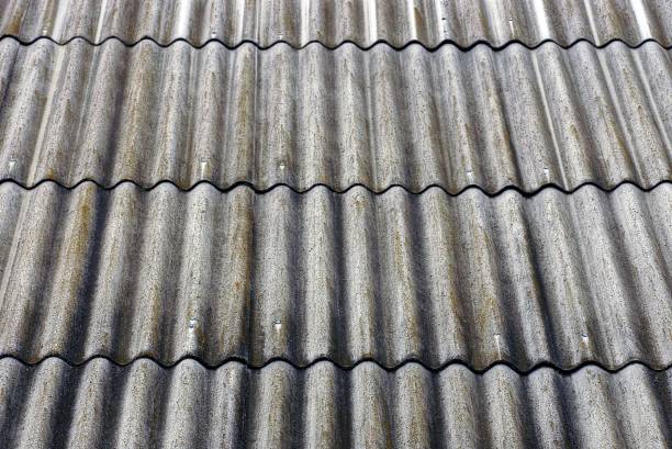 istock Texture of the old gray slate on the roof 909070616
