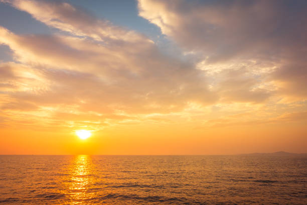 istock Beautiful sunset on the beach and sea 909070780