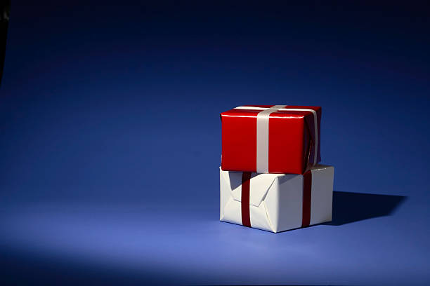 istock Red and White Christmas Presents on Blue 90907226