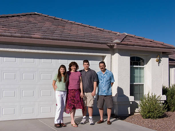 istock Family in front of Home 90907302