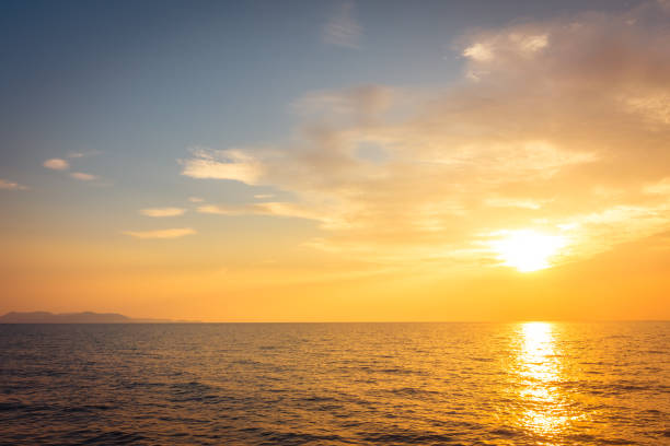 istock Beautiful sunset on the beach and sea 909075142