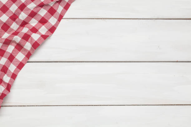 istock Color napkin wooden white background 909084872