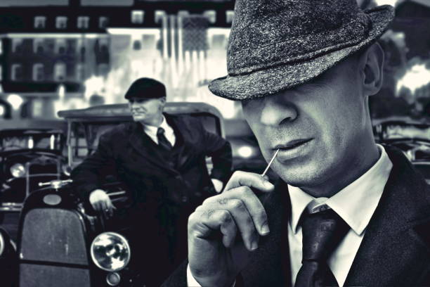 fashion mafia gangsters fashion bossy Italian mafia gangster in 1930's near classic car mafia boss stock pictures, royalty-free photos & images
