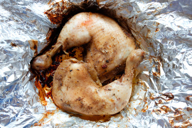 istock chicken legs roasted in foil top view 909089152
